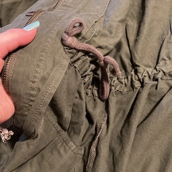 Army green, cinched waist jacket, with crocheted flower patches. - Picture 5 of 5